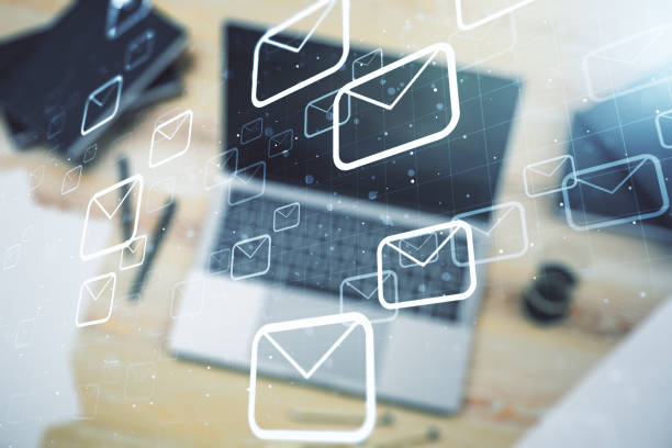 istock Creative concept of postal envelopes illustration on modern laptop background. Email and communications concept. Multiexposure 1211700857