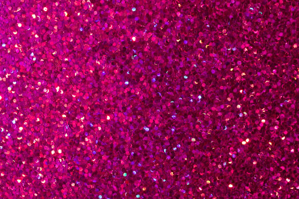 istock Beautiful rosy red confetti glitter abstract background 1211701700