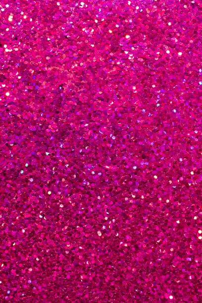 istock Beautiful rosy red confetti glitter abstract background 1211702412