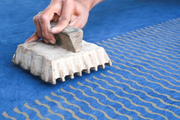 Wooden blocks for hand block printing at a factory in Bagru village, India. Wooden blocks for handmade printing in Bagru village, Jaipur, India. india jaipur rajasthan traditional culture stock pictures, royalty-free photos & images