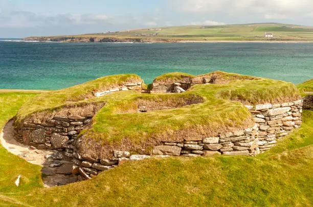 Photo of Ruins at Bay of Skaill, the location of the famous Neolithic settlement Skara Brae, Orkney Islands, Scotland