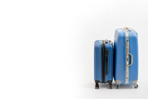 istock Two blue suitcase isolated on white background. Blue suitcase. 1211705375