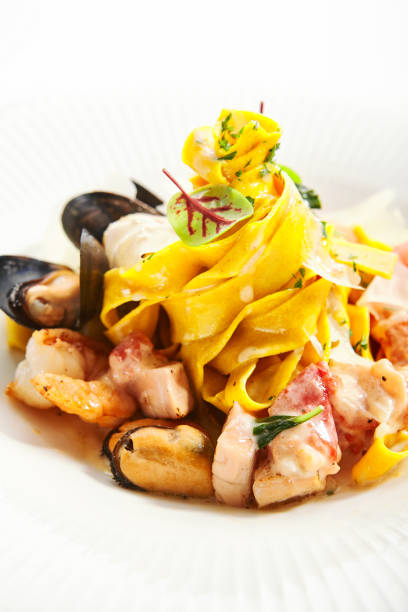 Tagliatelle pasta with seafood closeup view