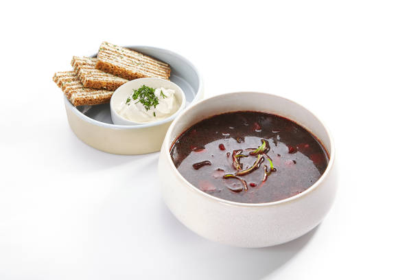istock Borscht in bowl with roasted toasts and sour cream 1211706332