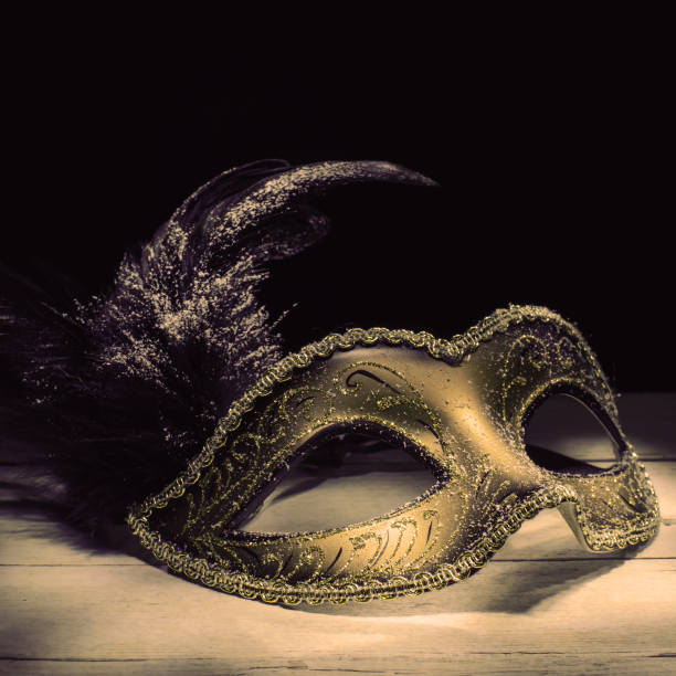 istock The Venetian mask with feather 1211706773