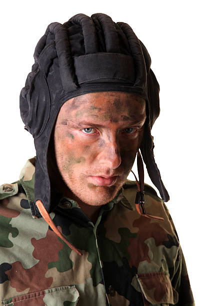 istock Soldier masked with camouflage paints 121170877