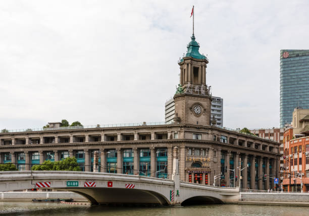 Historic General Post Office Building on the banks of Suzhou Creek Shanghai, China - October 6, 2019: General Post Office Building, on the banks of Suzhou Creek, built in 1924 in Classical style, in Hongkou, Shanghai. Historical architecture heritage of China. suzhou creek stock pictures, royalty-free photos & images