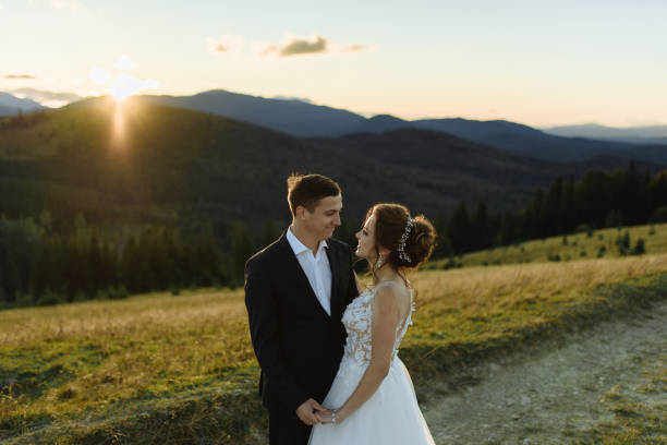 istock Beautiful bride and groom at the mountains 1211714998