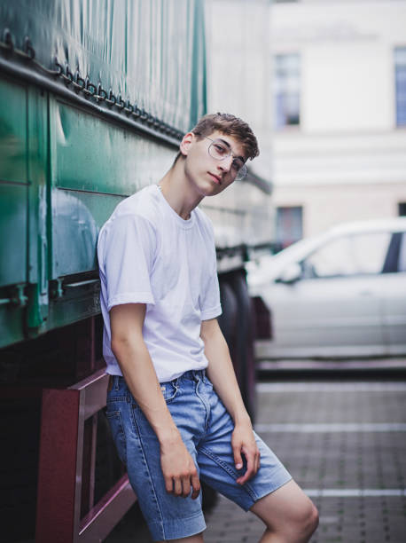 istock man with glasses and an empty white t-shirt 1211722536