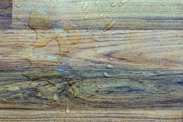 istock brown wood texture with water 1211722796