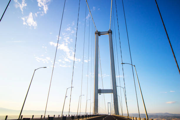 istock Blue sky, on the bridge and highway 1211724988