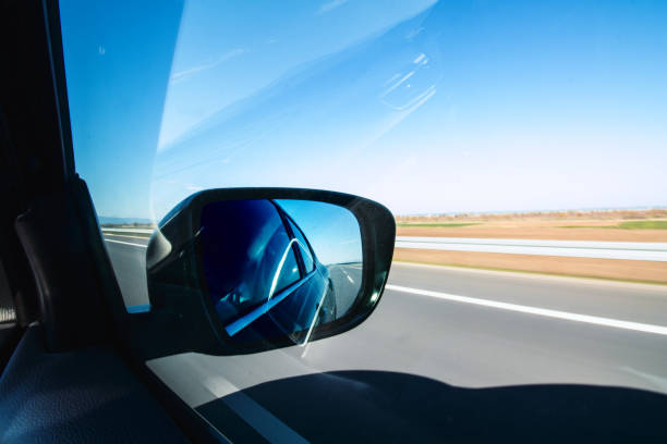 istock The mirror visible through the car on the road 1211725176