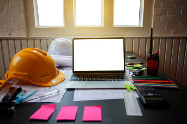 istock Concept Architect and desk of Architectural project in construction site or office building with mining light 1211727860