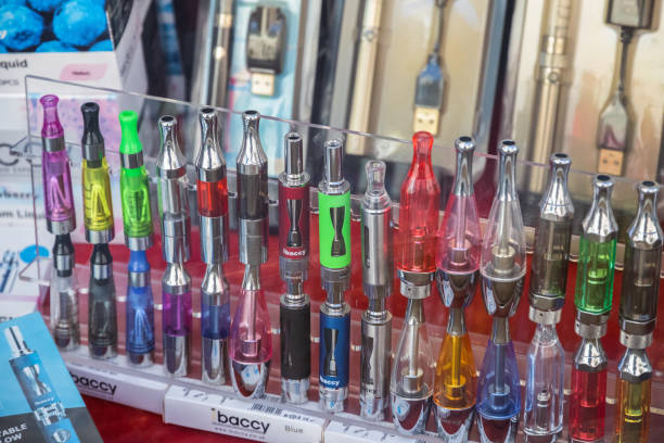 Electronic cigarettes displayed at window of a vape shop in central London stock photo