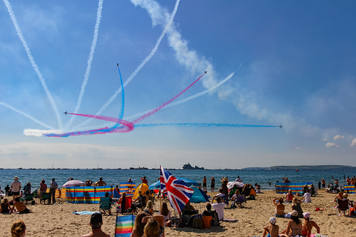 Boscombe, Dorset, England-September 2, 2017: The Red Arrows display team perform for the during the 10th yearly Bournemouth Air Show. The popular annual event is the largest free public festival in the country and attracted more than one million visitors to the town.