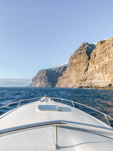 istock Sailing near the rocky coast 1211732846