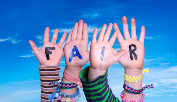istock Children Hands Building Word Fair, Blue Sky 1211735398