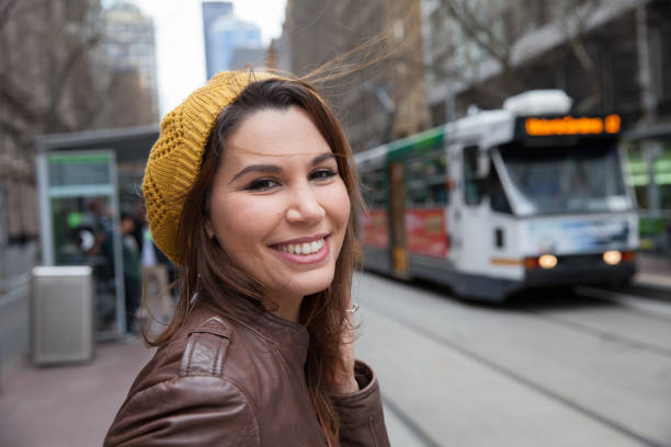 istock Female Tourist Exploring Downtown Melbourne in Winter 1211735428