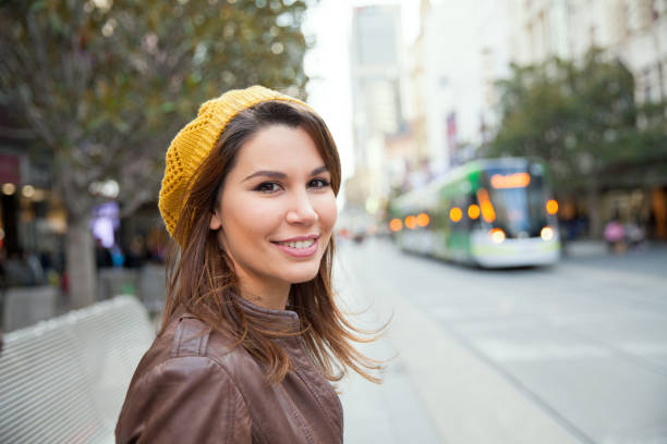 Female Tourist Exploring Downtown Melbourne in Winter