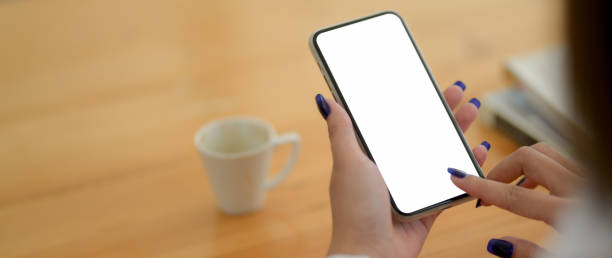 istock Cropped shot of young female university student using mock-up smartphone 1211736954