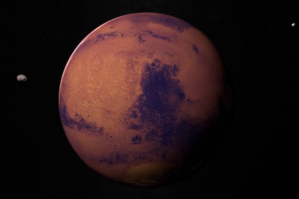 istock Satellites martians Phobos and Deimos orbiting around Mars planet. 3d render 1211739584