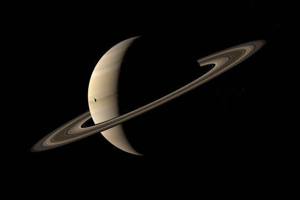 istock Satellite Janus orbiting around Saturn planet in the outer space. 3d render 1211739699