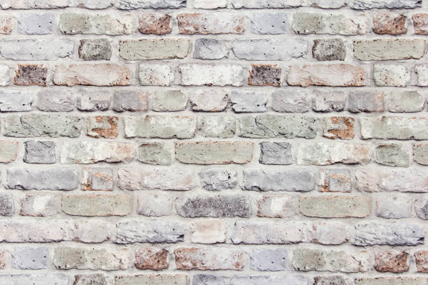 istock Ornamental brick wall forms part of interior 1211744227