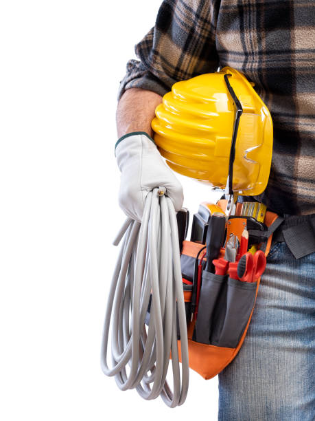 istock Electrician with tool belt on a white background. Electricity. 1211747481