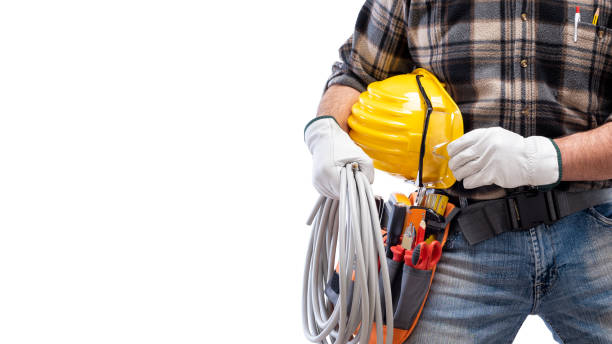 istock Electrician with tool belt on a white background. Electricity. 1211747488