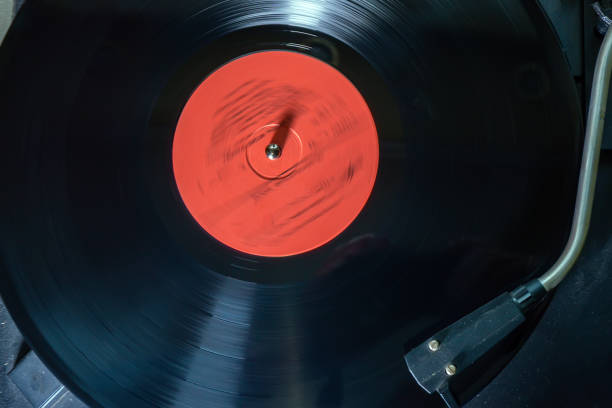 istock old-fashioned record player plays a track from black vinyl. spinning vinyl record player. To close. 1211752053