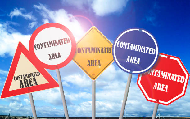 istock Road signs indicating contaminated area 1211752070