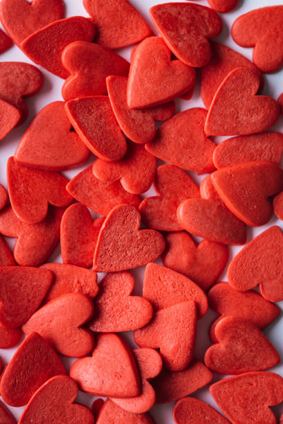 istock red candy hearts background, valentines day, banner 1211755685