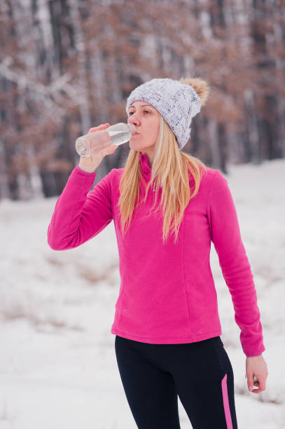 istock Women exercise outside at winter 1211755777