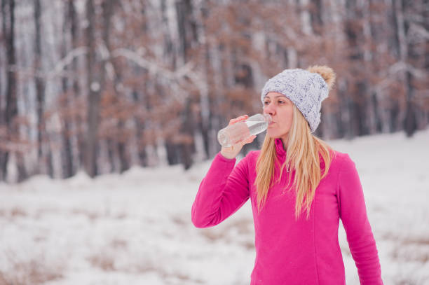istock Women exercise outside at winter 1211755968
