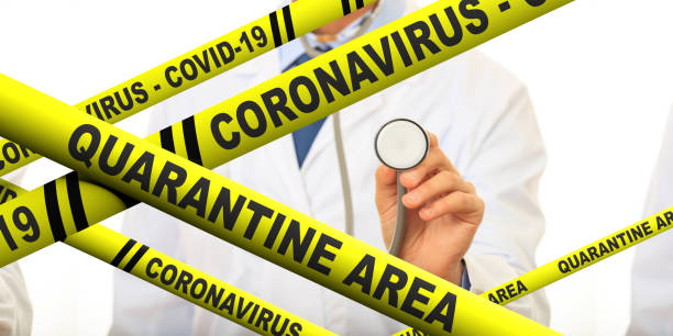 istock Covid19 coronavirus quarantine area text on yellow warning stripes, doctor with stethoscope background. 3d illustration 1211762098