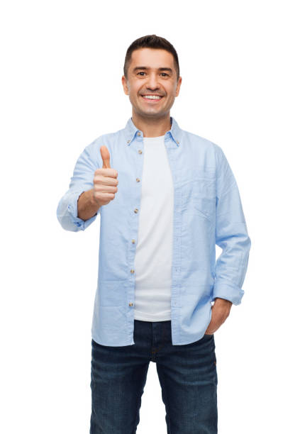 istock smiling man showing thumbs up 1211768856
