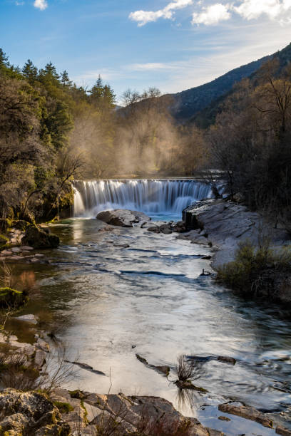 istock Vis waterfall at the end of winter in long exposure (Occitanie, France) 1211771196