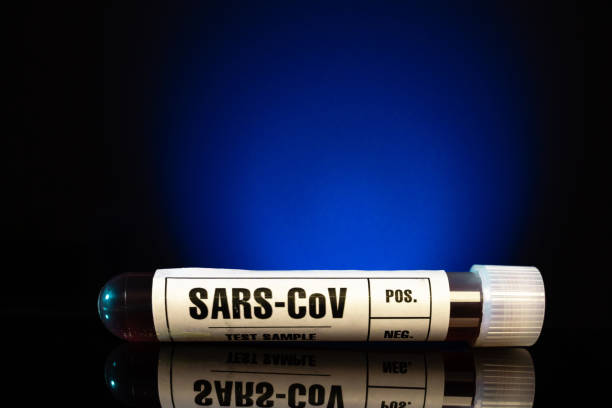 istock Sars-CoV virus blood test sample tube close-up 1211771530