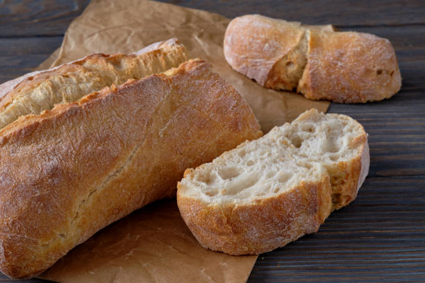 istock Sliced homemade  breads on wooden table 1211772566