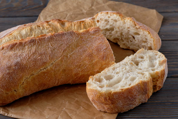 istock Sliced homemade  breads on wooden table 1211772607