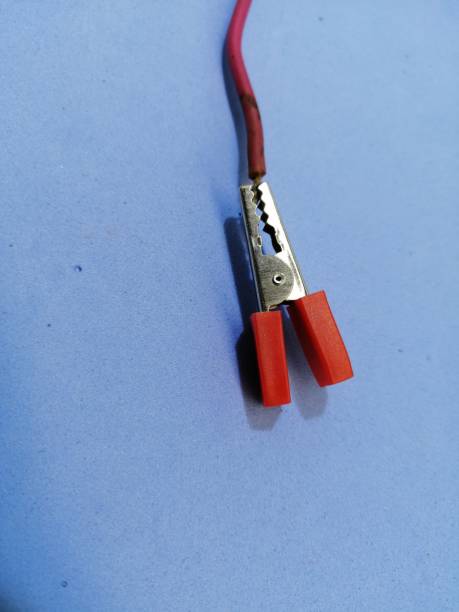 istock Crocodile probe attached to a copper wire 1211773862
