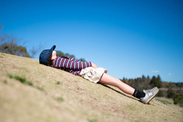 Girl taking a nap on the lawn