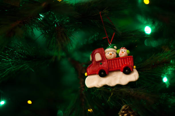 istock Christmas tree ornament with defocused lights 1211775634