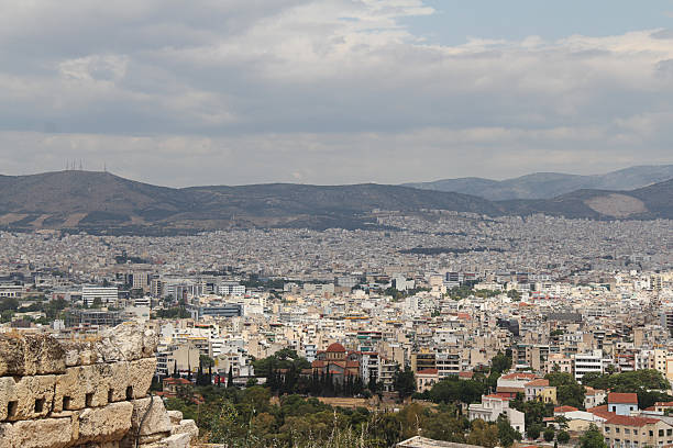 istock Landscape - City View with Hills and Cloudy Sky 1211775730