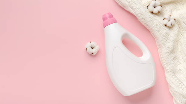 istock White plastic packaging of laundry detergent and soft sweater 1211775838