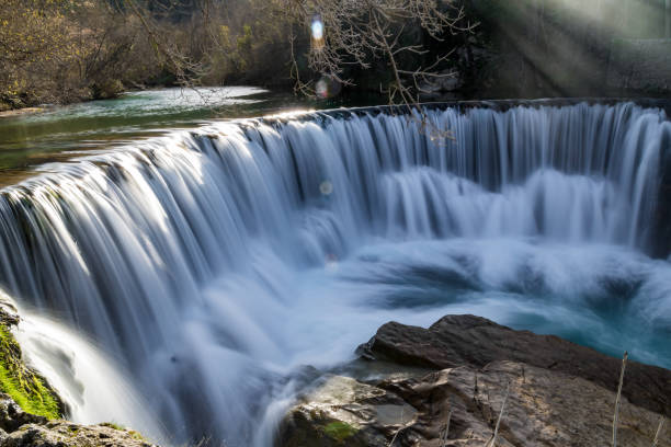 istock Vis waterfall at the end of winter in long exposure (Occitanie, France) 1211775842