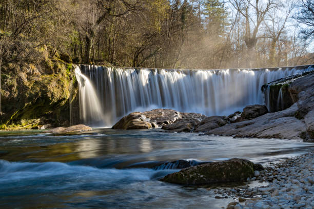 istock Vis waterfall at the end of winter in long exposure (Occitanie, France) 1211779301