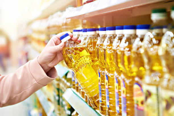 Sunflower oil in store Sunflower oil in the store cooking oil stock pictures, royalty-free photos & images