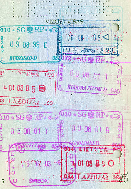 istock Passport page full of stamps 121178523