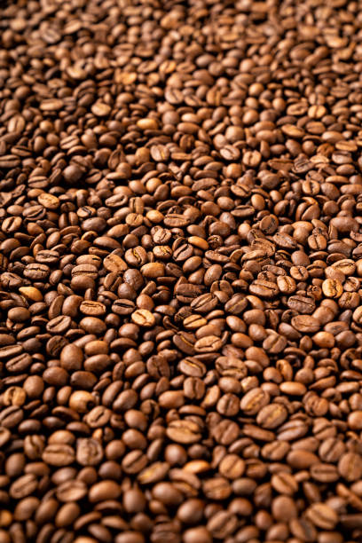 istock Close-up of roasted coffee beans 1211788450